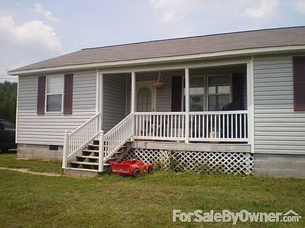 3br/1b Ranch Style Home
						:
						Gray vinyl siding with burgandy shutters