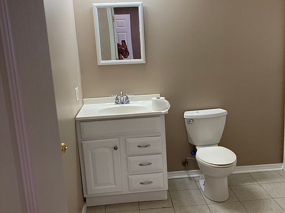 Full bathroom with tub/shower combo