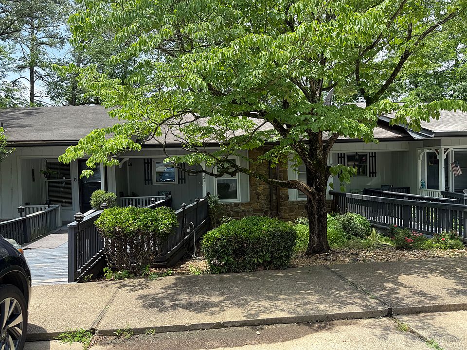 front yard with two parking spaces in front