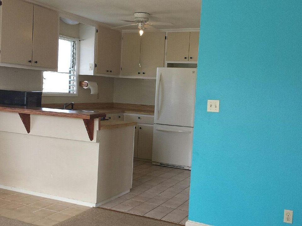 This wall is no longer blue. It is same color as the kitchen cupboards.