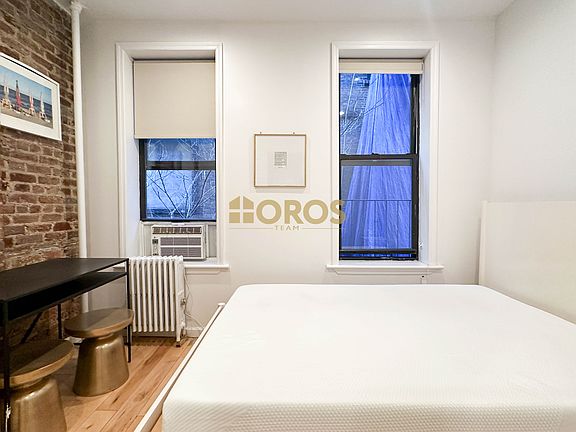 5th image of 213 E 10th St APT 8