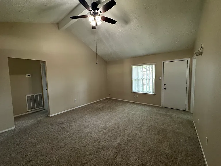 Main living room area. All new paint and carpet in the house.