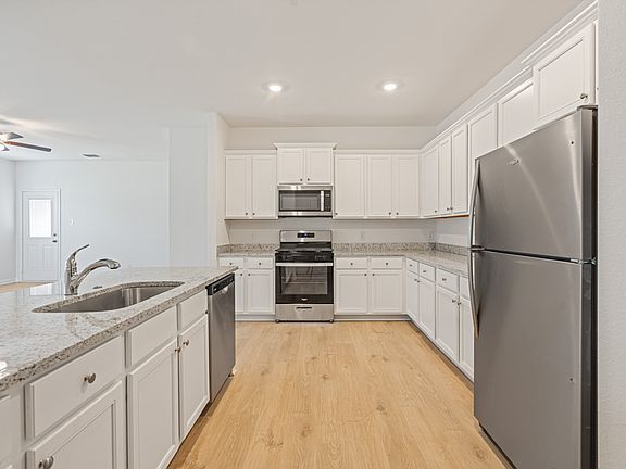 A chef-ready kitchen with granite countertops