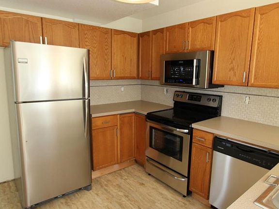 updated kitchen w/ SS appliances, counter tops and flooring