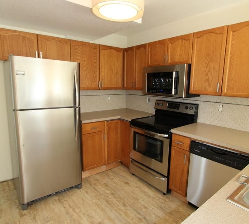 updated kitchen w/ SS appliances, counter tops and flooring