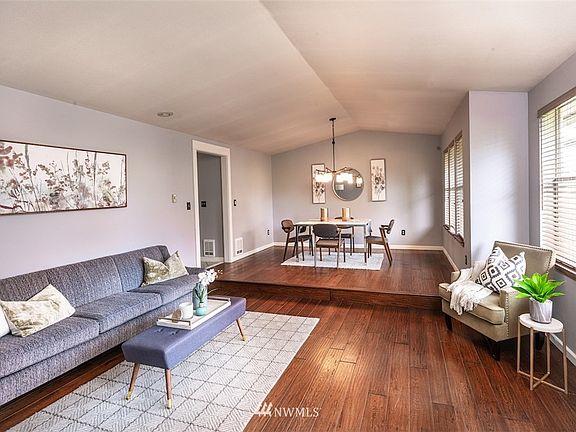 Beautiful living room with plank floors and new paint