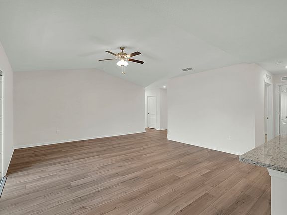 Enjoy time with family and friends in this spacious, open family room.