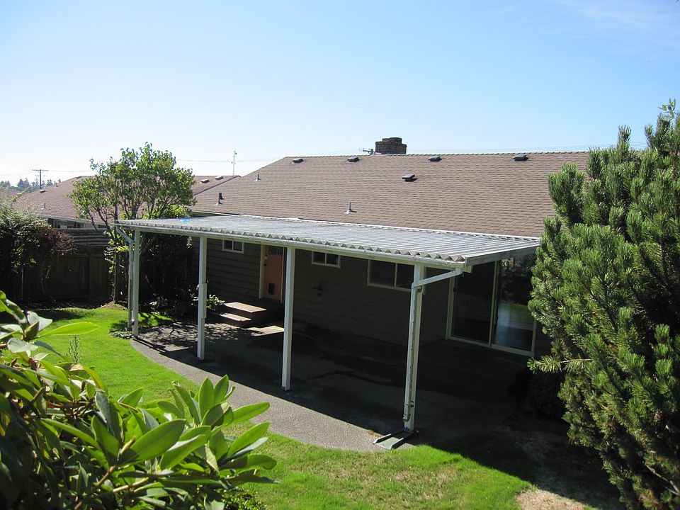 Covered patio in 2 tiered bkyd