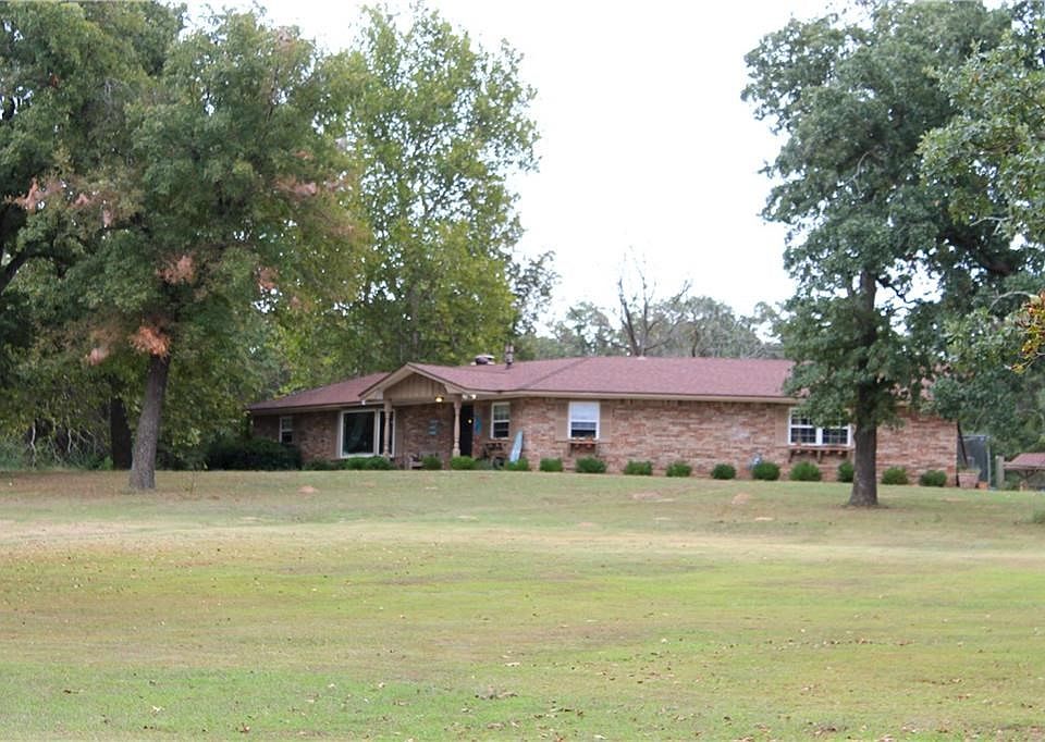 3 bedroom, 2 bath brick home on 8 wooded acres.
