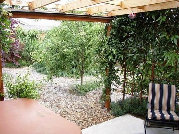 Back patio, hot tub, yard