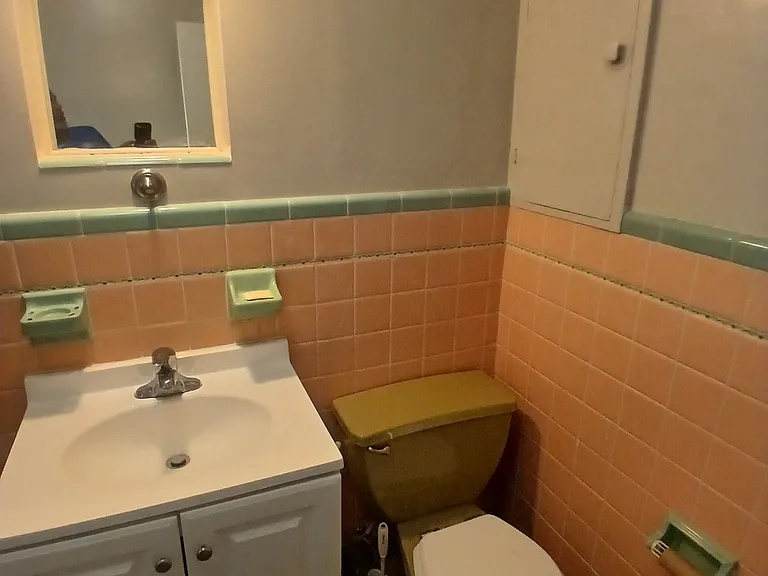Close up of bathroom cabinet area.