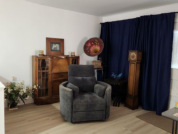 Sitting area. Can also see the TV