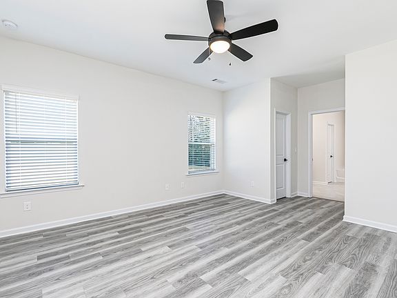 The master bedroom is the perfect place to unwind after a long day