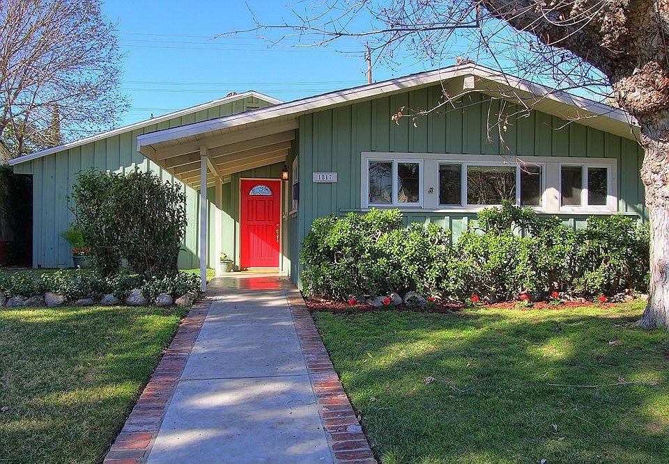 Tucked away on a cozy, tree-lined street is this charming home