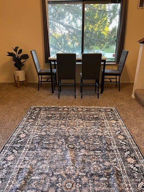 Dining room. Balcony patio adjacent.