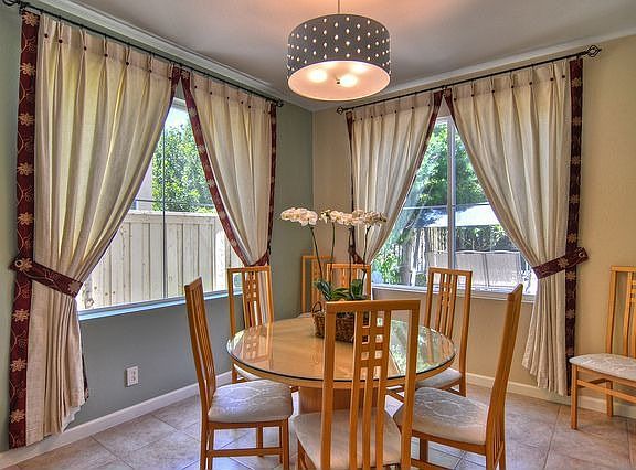 Formal dining room with custom chandelier