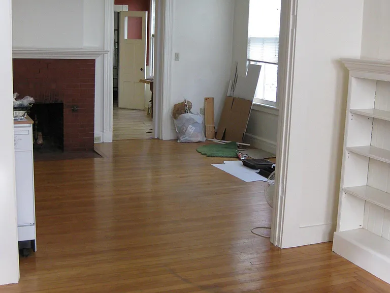 Front room opens to middle room. This bonus room has been used as a living room, dining room, or study. Measures at 14' x 14'.