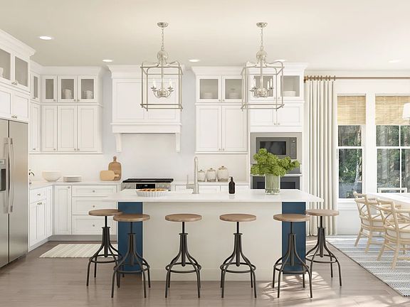 Kitchen with island, pendant lighting and glass-front upper cabinets