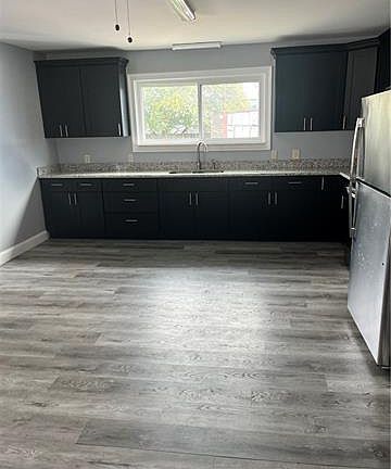5th image of 255 Laroussini St
