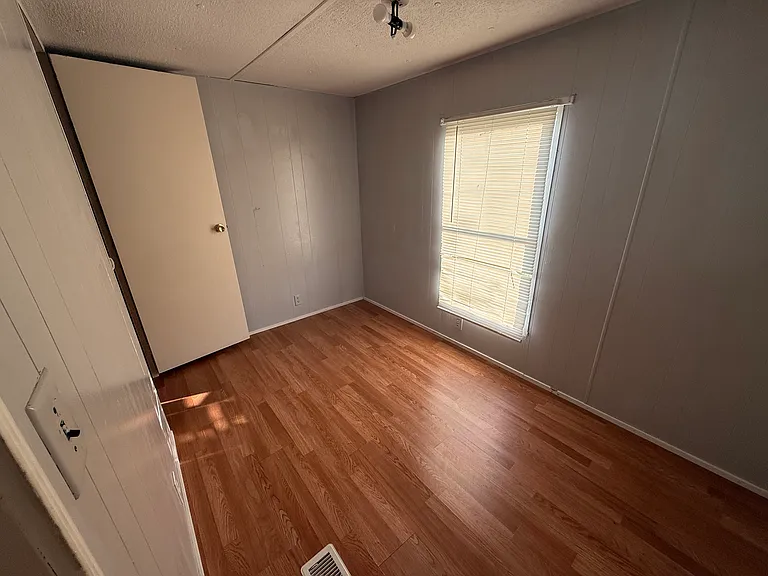 Third bedroom. New flooring and paint.