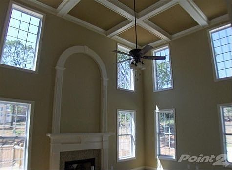 Family Room with Custom Trim & Coffered Ceilings