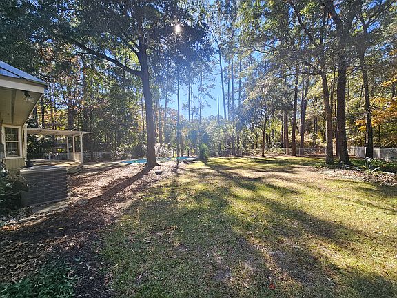 FENCED IN SPACIOUS BACKYARD, SWIMMING POOL