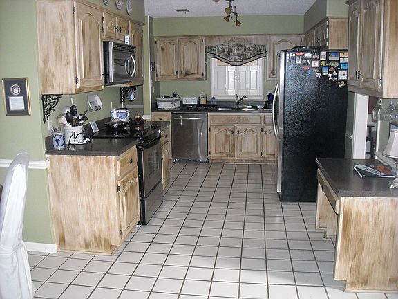 Update kitchen with stainless steel appliances.