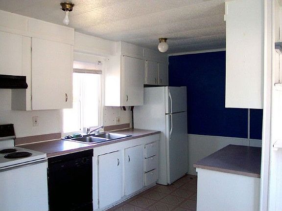 Convient kitchen with all the modern appliances, looking South West.