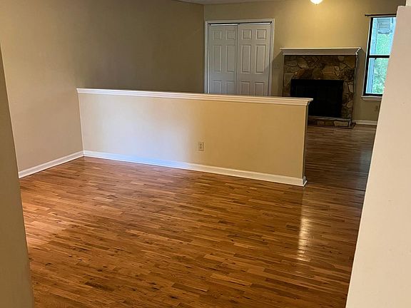 middle level-living room/dining room. Has gas fireplace
