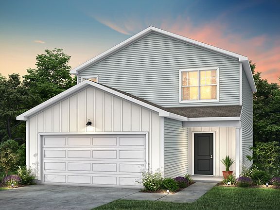 Raven Exterior TD102 features siding, covered front door and 2 car garage