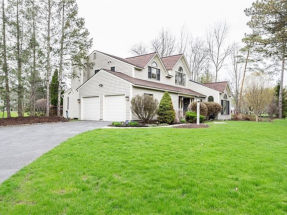 Side Loading 2 Car Garage on a corner lot makes for Stunning Curb appeal!