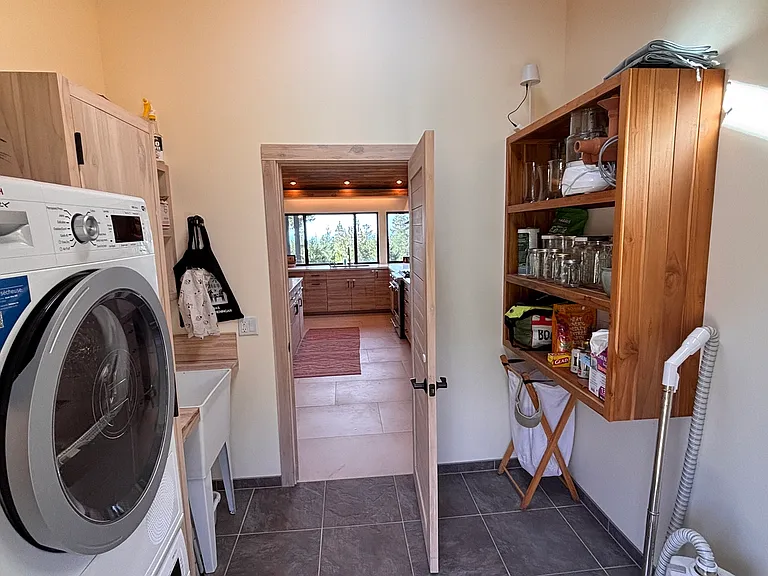 From exterior entry into mudroom then kitchen.
