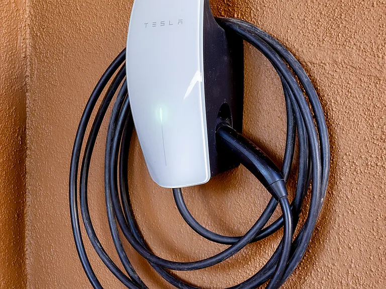 Charge your electric car in our vintage carport.