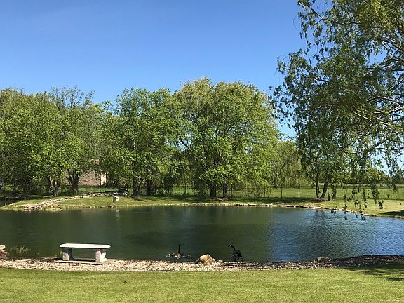 Pond/waterfall/rock beach