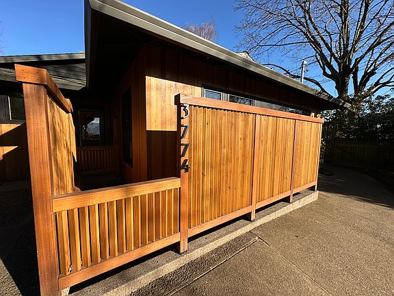 walkway to front door with view of access to apartment