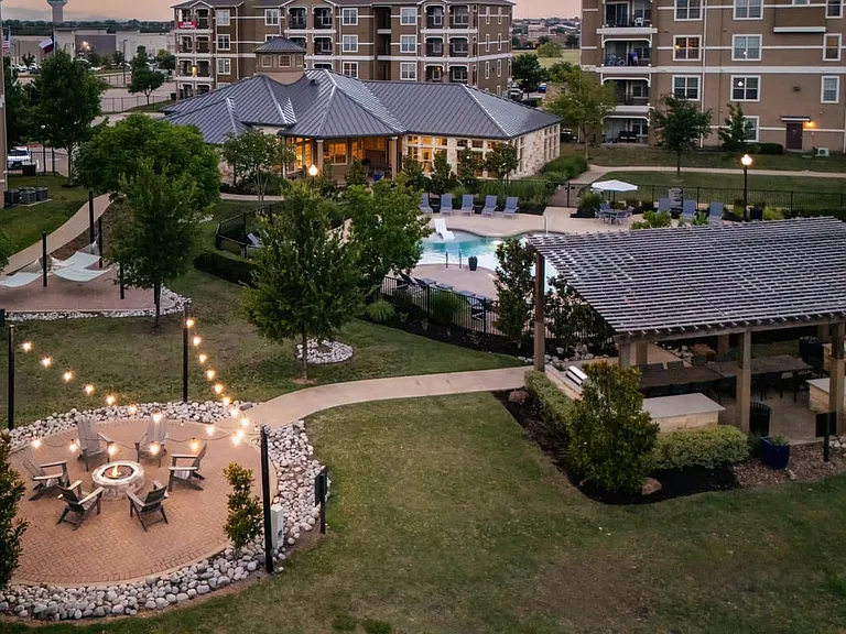 Courtyard with fireside, grill stations, and pool