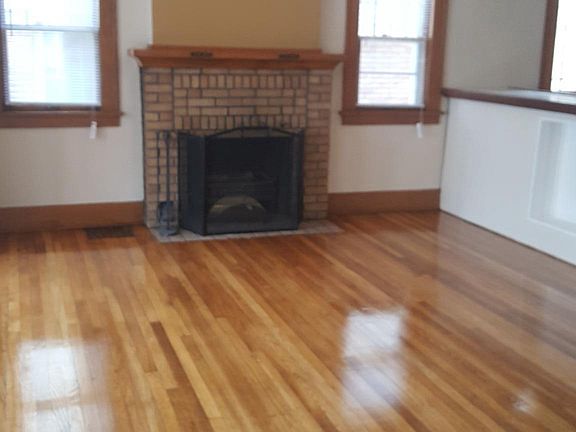 Wood burning fireplace. BEAUTIFUL hardwood gloors, just ref