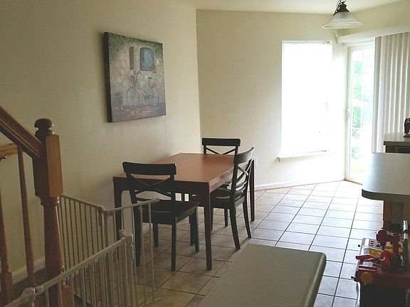 eating area and kitchen towards back entr.