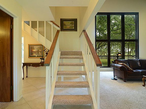 Walking in the front entry, you'll immediately notice the expert blending of nature and architecture.