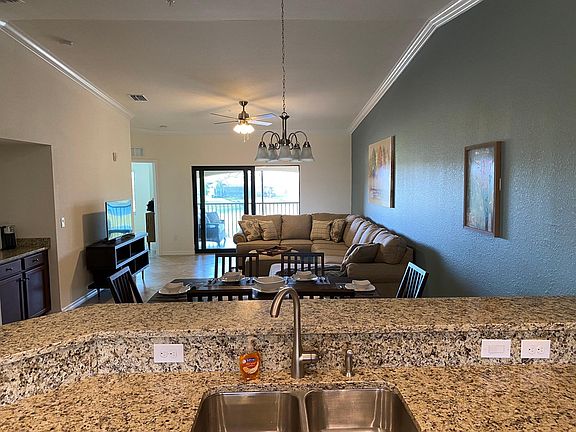 Kitchen looking out to Lanai on fairway of hole 1