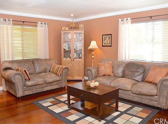 Hardwood Flooring, Crown Moldings, Custom Colors and Window Treatments