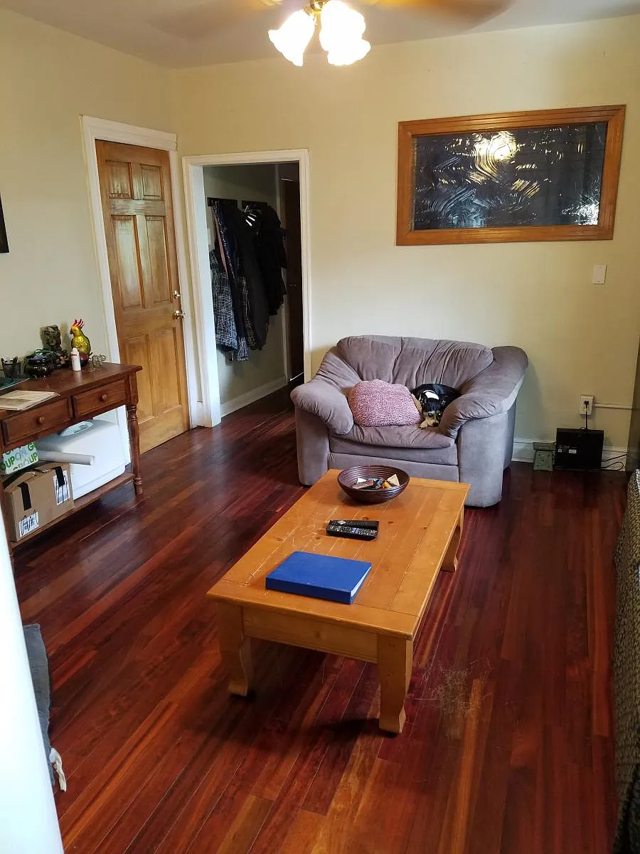 Living room with Cherry Wood Floors! - 1560 Vine St #4-2