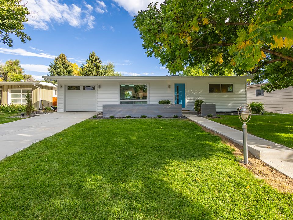 Shaded front yard with patio