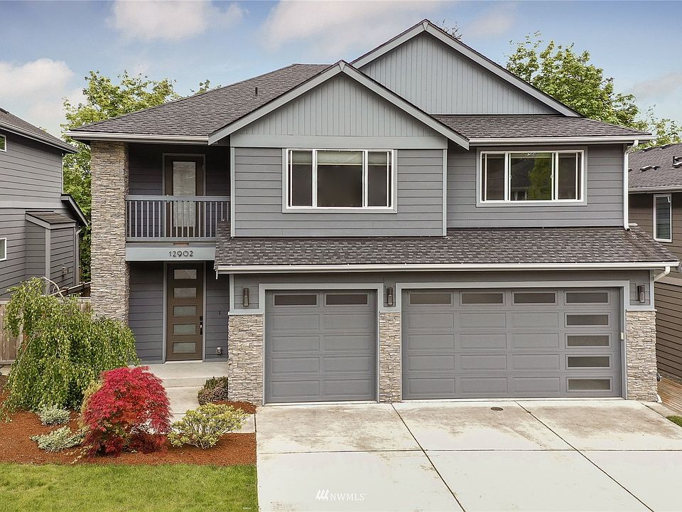 Impressive modern elegance with a three car garage. Conveniently located close for all your commuting and shopping needs. Large trees line the back of the property which gives you a great sense of privacy in this amazing community.