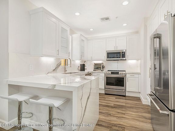 5th image of 344 N Bromeliad Ave #344