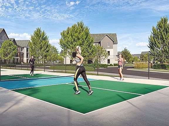 Experience active living with our vibrant pickleball courts set amidst serene scenery and elegant homes.