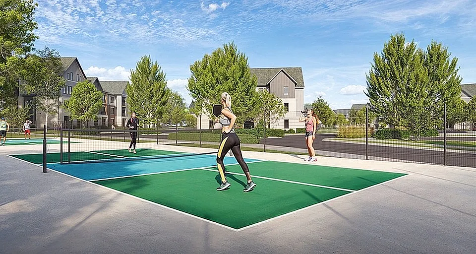 Experience active living with our vibrant pickleball courts set amidst serene scenery and elegant homes.