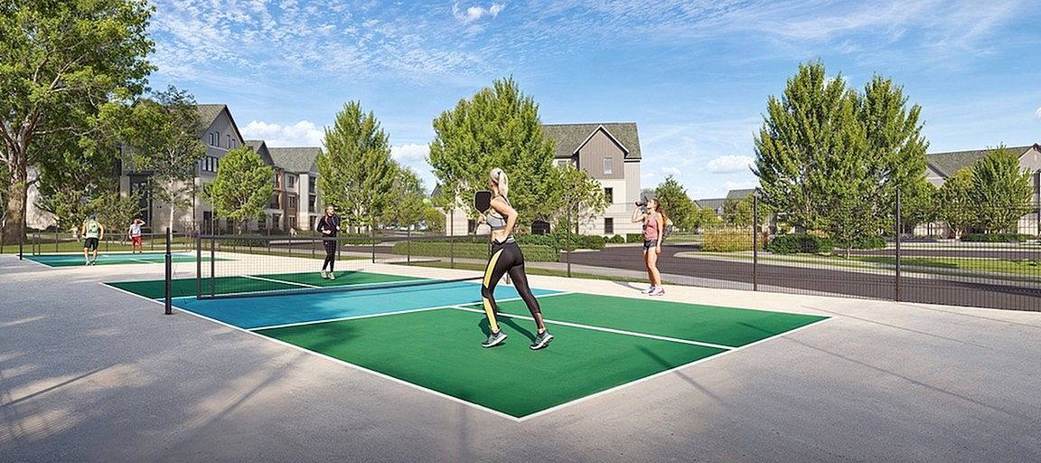 Experience active living with our vibrant pickleball courts set amidst serene scenery and elegant homes.