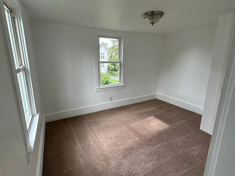 Secondary bedroom includes lots of natural light and a large closet.
