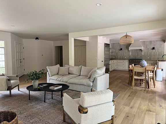 Open-concept living with seamless indoor/outdoor flow. Brand new flooring, furniture and details throughout.